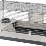 How does the Ferplast Krolik Green Rabbit Cage Deluxe promote pet comfort and well-being?